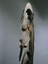 Stylised figure of spirit, known as Yipwon, that assists men with hunting and head hunting, kept in the mens house and hidden from women and uninitiated