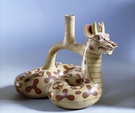 Stirrup spouted zoomorphic jar with composite animal made up of a feline fanged deer head on a serpent body