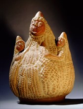 Mochica effigy jar depicting three anthropomorphised maize cobs whose fanged mouths and staring eyes suggest they are gods associated with fertility and food
