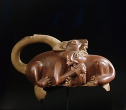 Fragment of a Mochica stirrup spouted jar showing two creatures fighting