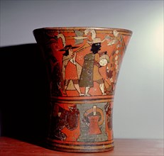 Ritual drinking vessel (kero), with Inca Spanish colonial decoration