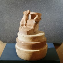 Vessel depicting copulating dogs