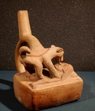 Stirrup spouted vessel depicting a woman copulating with a dog