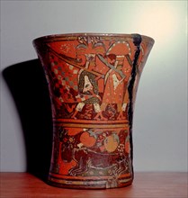 A ritual drinking vessel known as a kero