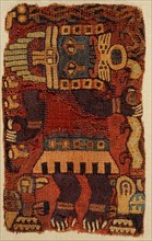 The oculate being in his human form, wearing a typically Paracas style golden diadem, and holding a trophy headed snake