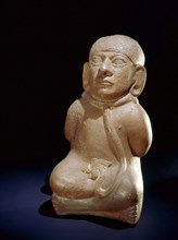 Mochica vessel in the form of a seated prisoner with his hands bound behind his back