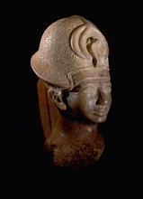 Statue depicting the Pharaoh Amenhotep III wearing the Blue Crown (khepresh)