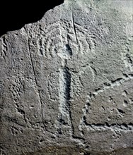 Rock engraving depicting a warrior with a feathered headdress