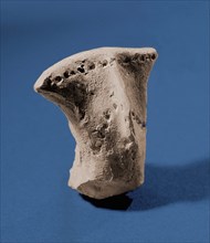 A head of unfired clay