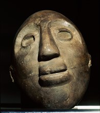 This stone head was carved by the Cole people, descendants of Hopewell in Ohio