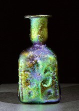 Late Roman amber glass jar with multicoloured iridescence