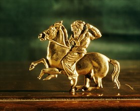 Plaque in the form of a Scythian horseman brandishing a spear