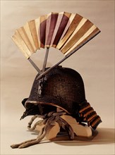 Helmet adorned with a war fan