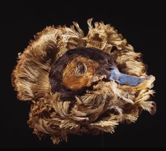 Ornament made of feathers to represent a mallard duck