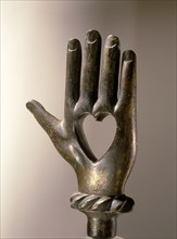 A finial of a staff used in the Cult of the Sacred Heart