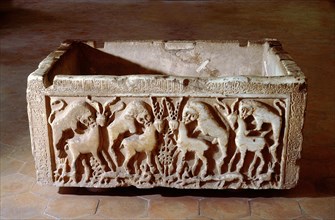 A marble ablution tank, known as The Alhambra Basin, with carved design of lions and gazelles