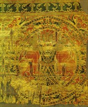Detail of the so called Gilgamesh motif on a silk weaving found in the tomb of Bishop Bernard Calvo of Vich