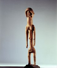 A Bari standing female figure