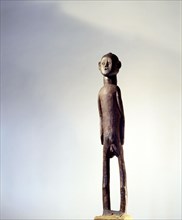 A Bongo male figure, probably for use as a grave marker or memorial
