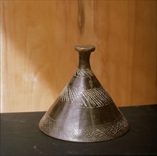 Cone shaped cover for a vessel finely shaped decorated Meroitic graphite ware
