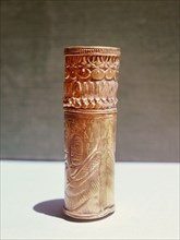 Ornamented gold cylinder, possibly a sheath for holding papyrus, from the tomb of the Kushite king Aspelta near Napata