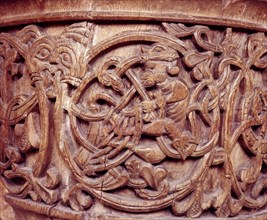 Carving on a baptismal font