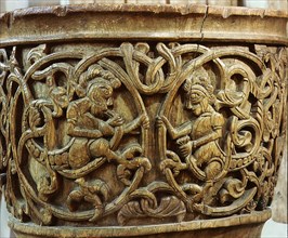 Carving on a baptismal font
