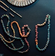 Coloured and ornamented glass beads which sometimes included beads of silver and gold