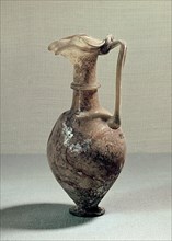 Glass vase with elaborate spout