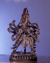 Five headed ten armed tantric form of the god Ganesha with both feet on his vehicle, the rat