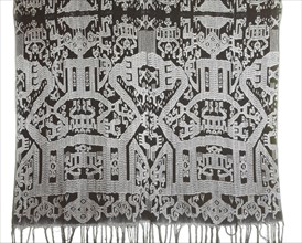 On this Atoni warp ikat mans cloth, selimut, all extremities of the figure merge into birds