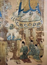 Detail of an embroidered silk banner of the Buddha Sakyamuni preaching on Vulture Peak