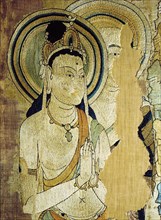 Detail of an embroidered silk banner of the Buddha Sakyamuni preaching on Vulture Peak