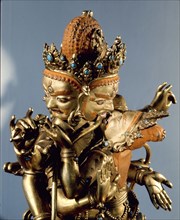 A yab yum icon of Mahhacakravajrapani, or Vajrapani, one of the five Dhyani bodhisattvas, with his prajna, the Tibetan sakti