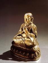 A statue in the form of a portrait of a deified teacher (lama), possibly Taklung Lama Thangpa Chenpo (1142 1210), who was the first abbot of the Taklung monastery of the Kagyu order