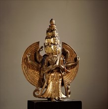 A statue of the eleven faced, thousand armed Avalokitesvara, the Bodhisattva of Compassion