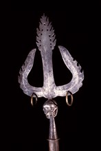 Iron trident with silver skull at base