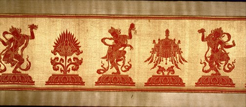 Sino Tibetan silk and gold brocade altar cloth depicting eight auspicious emblems interspersed by puja devis (offering goddesses) who offer gifts to the five Dhyani Buddhas, or Buddhas of meditation
