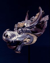A holy water vessel in the form of a bulls head