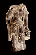 Bodhisattva torso carved in black stone