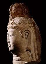 Head of a Bodhisattva, one who had attained enlightenment but remained earth bound in order to bring salvation to all