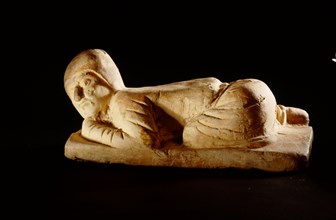 Tomb figure (miniature pillow) in the form of a kowtowing Persian trader