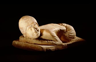Tomb figure (miniature pillow) in the form of a kowtowing Persian trader