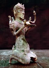 Bronze Dong Son tomb figure of a kneeling lamp bearer