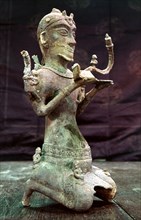 Bronze Dong Son tomb figure of a kneeling lamp bearer