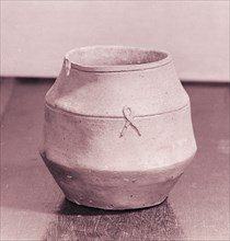 Urn shaped pot lightly glazed