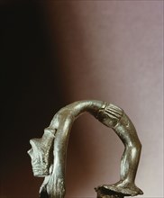 Figure of a backward bending goddess