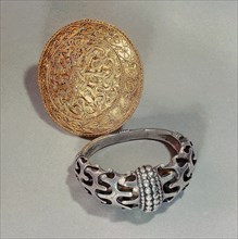 Arm ring and brooch