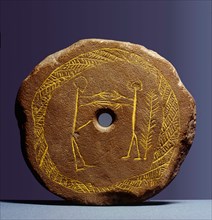 Lid of a cremation urn with fertility symbols