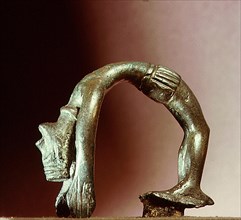 Figure of a backward bending goddess